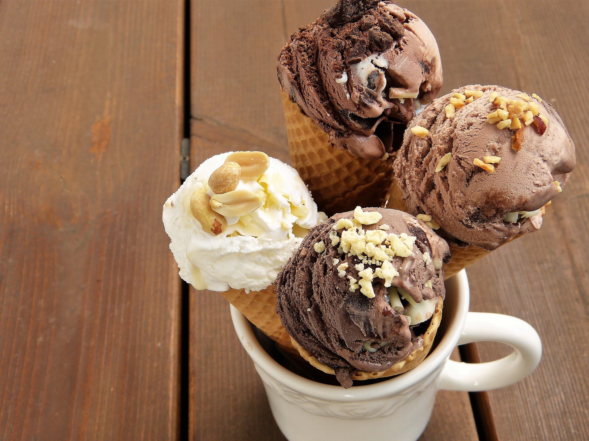 A mug full of four ice cream scoops