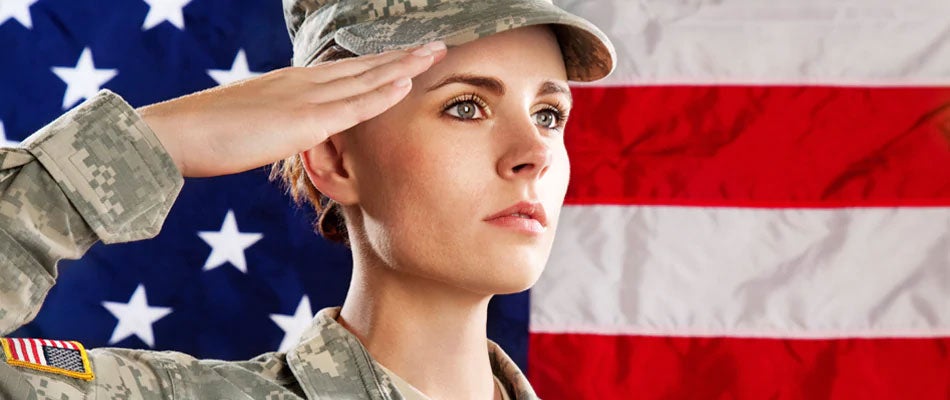 Officer Saluting in front of flag